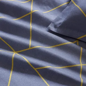 Pamučna posteljina bračna — zlatne linije na sivoj — detalj