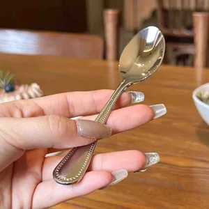 Kašike s ukrasnim rubom drške, set od 6 — 11 cm, za kafu (slika 2)