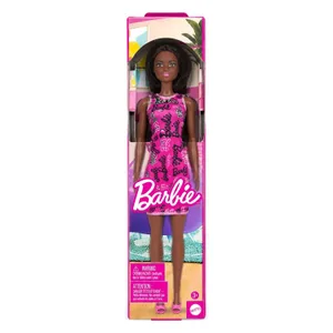 Barbie lutka s dugom crnom kosom u ružičastoj haljini, u pakovanju